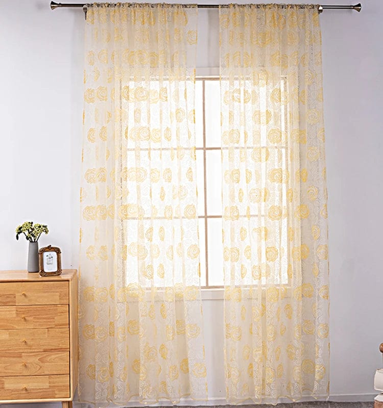 Voilage jaune à motifs roses