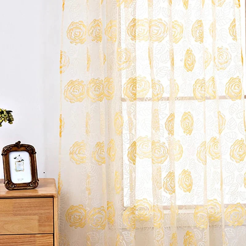 Voilage jaune à motifs roses